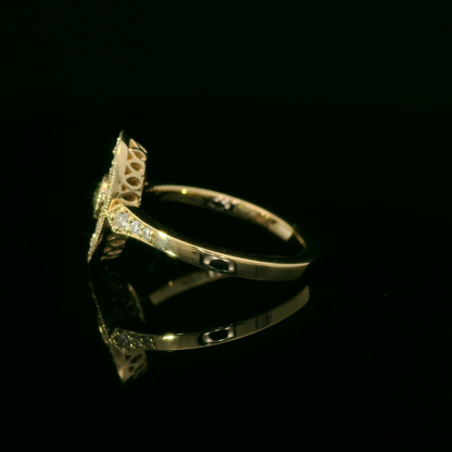 Elegant Gold Ring with Green Gemstone