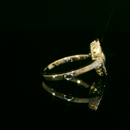 Elegant Gold Ring with Green Gemstone