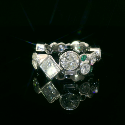 Elegant Diamond and Emerald Bracelet