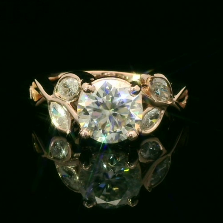 Leaf Inspired Ring with Round and Marquise Cut Diamonds