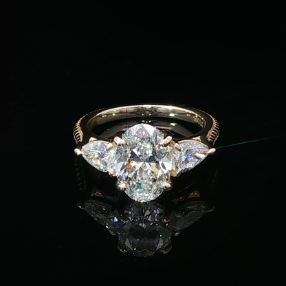 “The First Lady” - Oval and Pear Shape Diamond Engagement Ring in 14k Yellow Gold