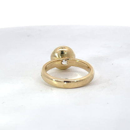 Elegant Gold Ring with Custom Bezel Set Diamond