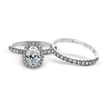 Oval-cut Halo Engagement Ring & Matching Wedding Band in 18K Gold with Diamonds
