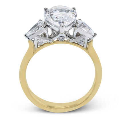 Pear-cut Three-stone Engagement Ring in 18k Gold with Diamonds