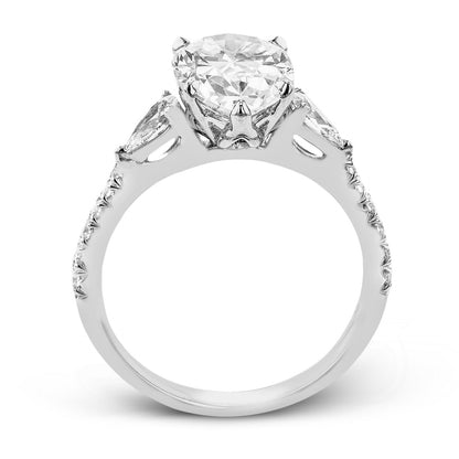 Pear-cut Three-stone Engagement Ring in 18k Gold with Diamonds