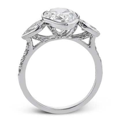 Pear-cut Three-stone Engagement Ring in 18k Gold with Diamonds