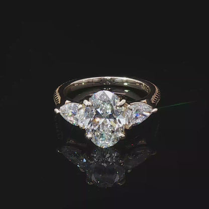 “The First Lady” - Oval and Pear Shape Diamond Engagement Ring in 14k Yellow Gold