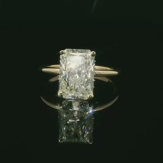 Radiant Cut Diamond Solitaire Ring in Gold