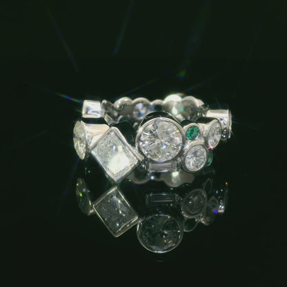 Elegant Diamond and Emerald Bracelet