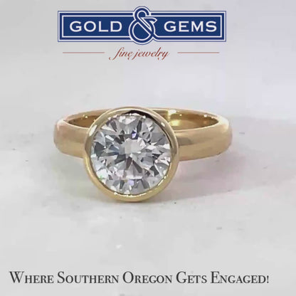 Elegant Gold Ring with Custom Bezel Set Diamond