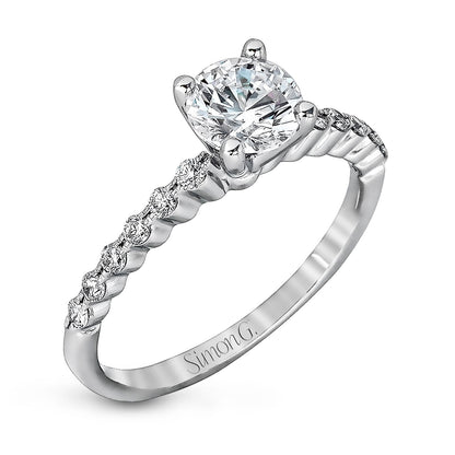 Round-cut Engagement Ring & Matching Wedding Band in 18k Gold with Diamonds