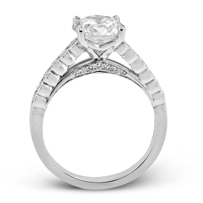 Round-cut Micro-bezel Engagement Ring in 18k Gold with Diamonds