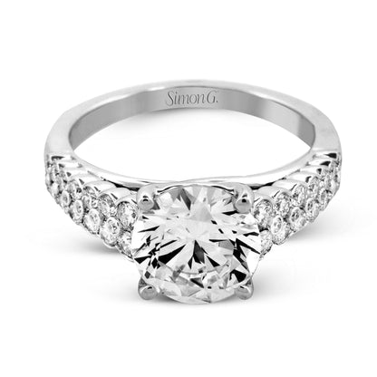 Round-cut Micro-bezel Engagement Ring in 18k Gold with Diamonds