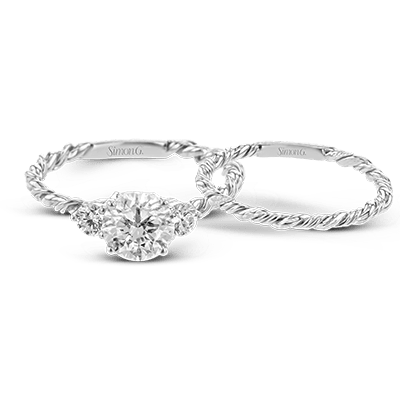 Round-cut Three-stone Engagement Ring & Matching Wedding Band in 18k Gold with Diamonds