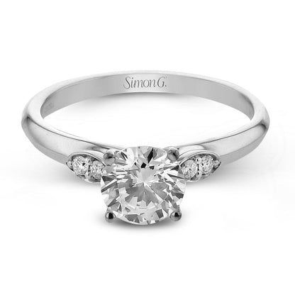 Round-cut Three-Stone Engagement Ring & Matching Wedding Band in 18k Gold with Diamonds